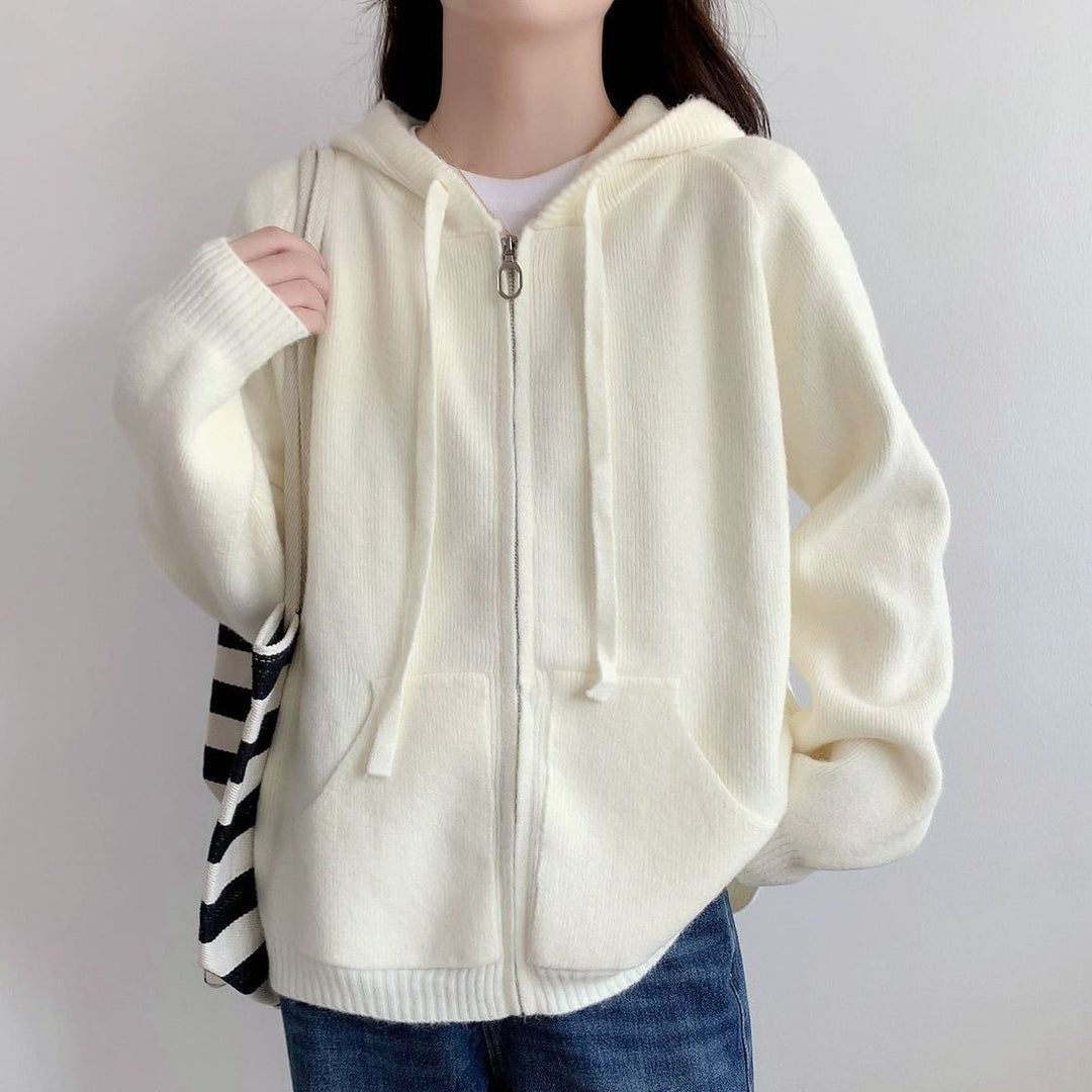 Veste à capuche pour femmes surdimensionnée avec une coupe courte et des poches pratiques Chic & Stil