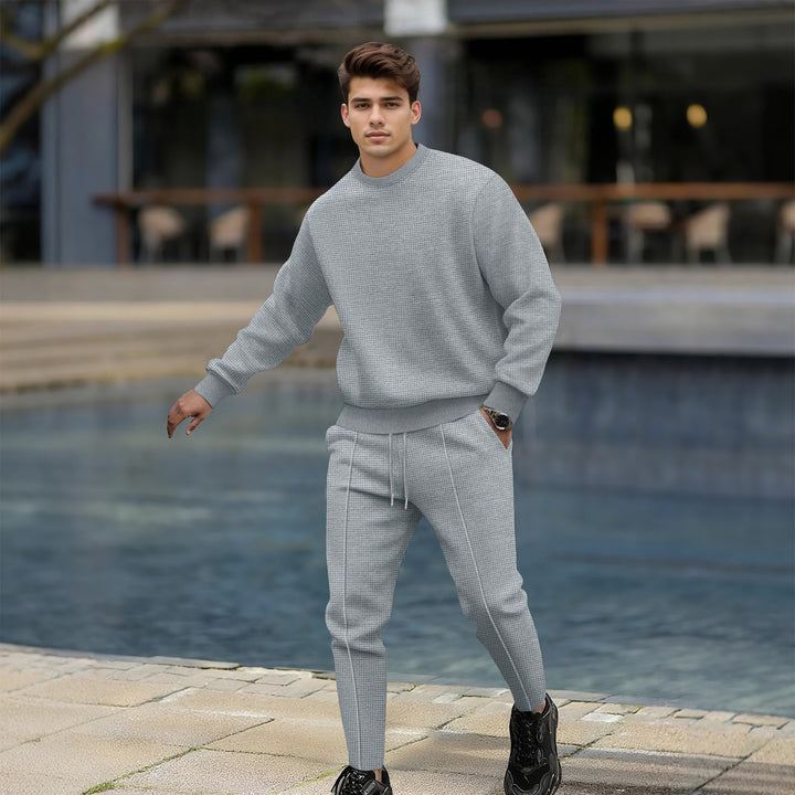 Trendy men's jogger set with textured top and slim-fit pants Lune London
