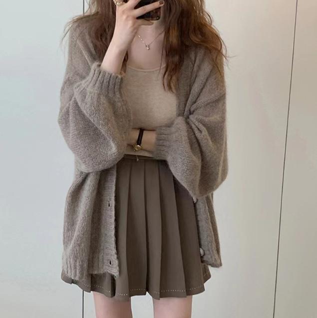 Elegant knit jacket with wide sleeves and refined details Lune London