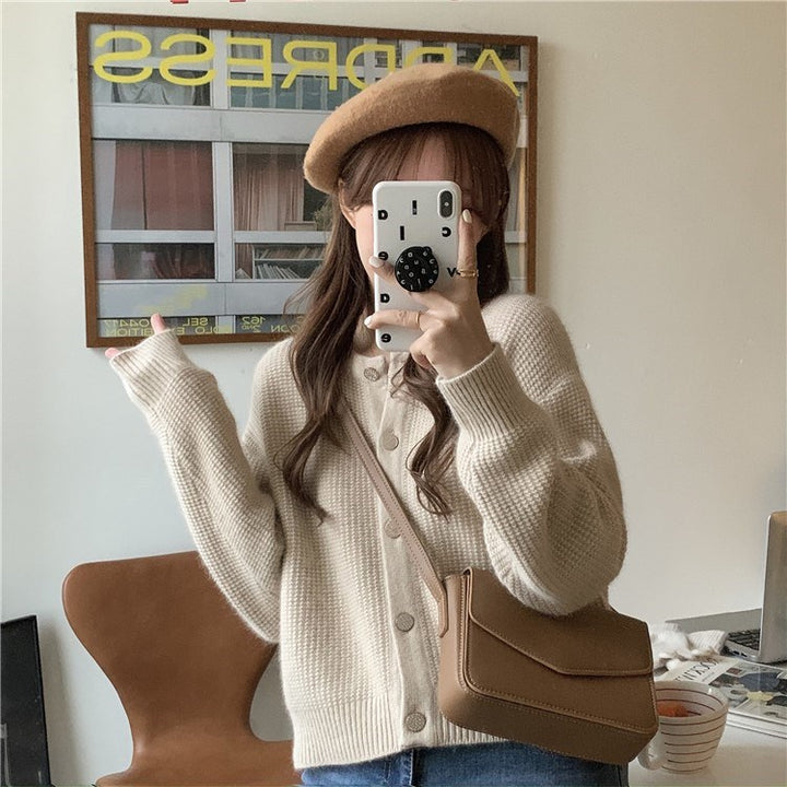 Cardigan pour femmes avec des détails de bouton sophistiqués et une coupe large Chic & Stil
