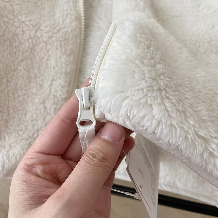 Veste en polaire confortable pour femmes avec col montant et fermeture éclair latérale Chic & Stil