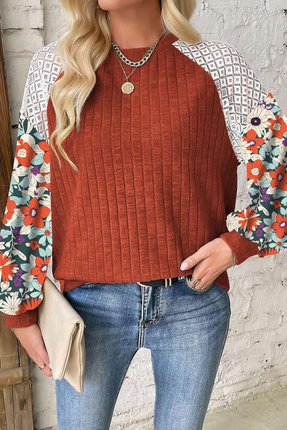 Women's sweater with a playful shape featuring a chic floral sleeve design