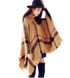 Knit poncho for women with high collar and trendy fringe design Lune London