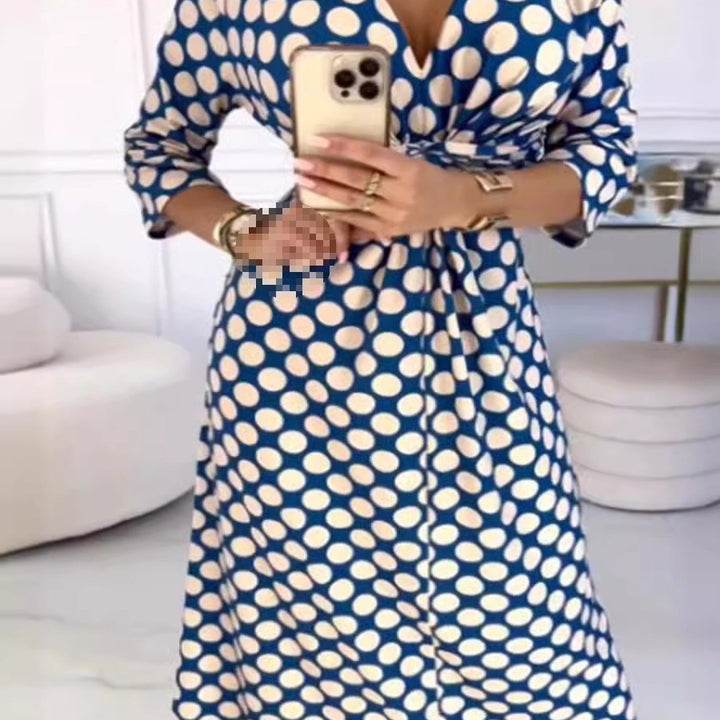 Maxi dress for women with a modern polka dot pattern and an elegant crossover appearance Lune London