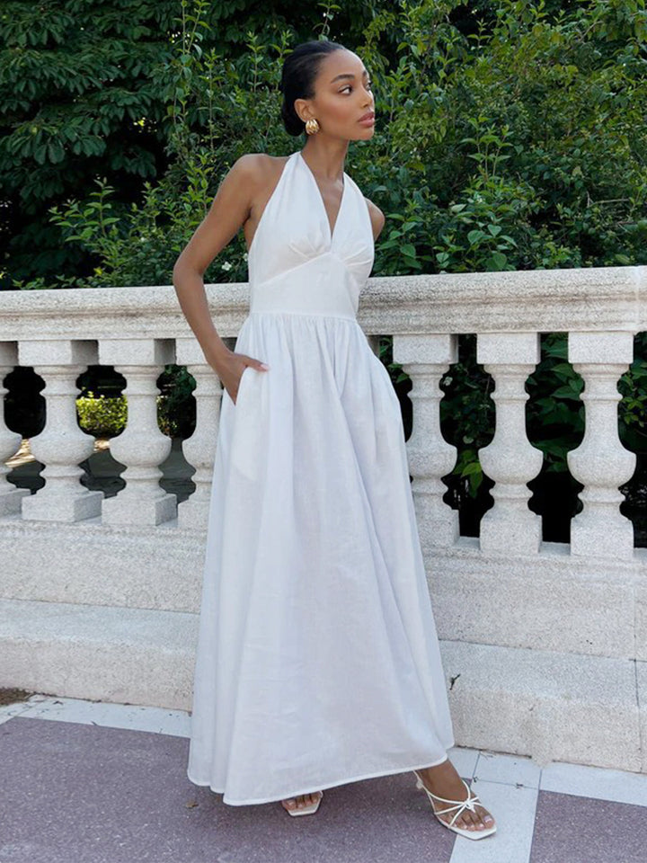 Elegant maxi dress for women with open back design and flowing skirt Lune London