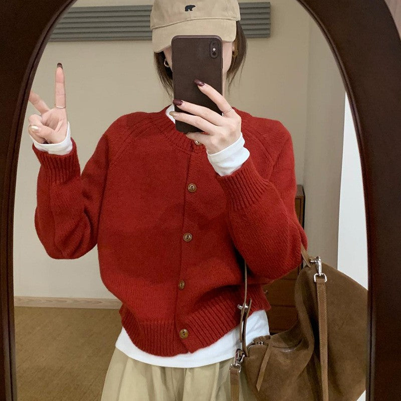 Comfortable knit sweater for women with button details and dropped shoulders Lune London
