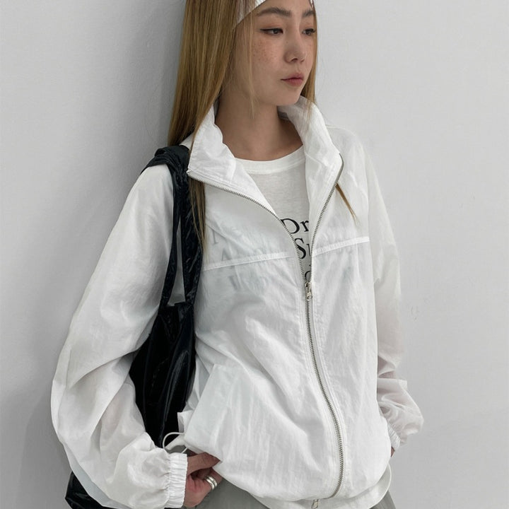 Veste coupe-vent légère pour femmes avec col haut Chic & Stil