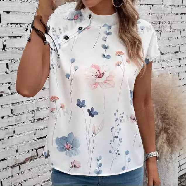 Women’s blouse with floral pattern and cape sleeves Lune London