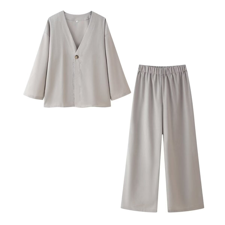 Ladies outfit consisting of an elegant V-neck blouse and wide palazzo pants Lune London