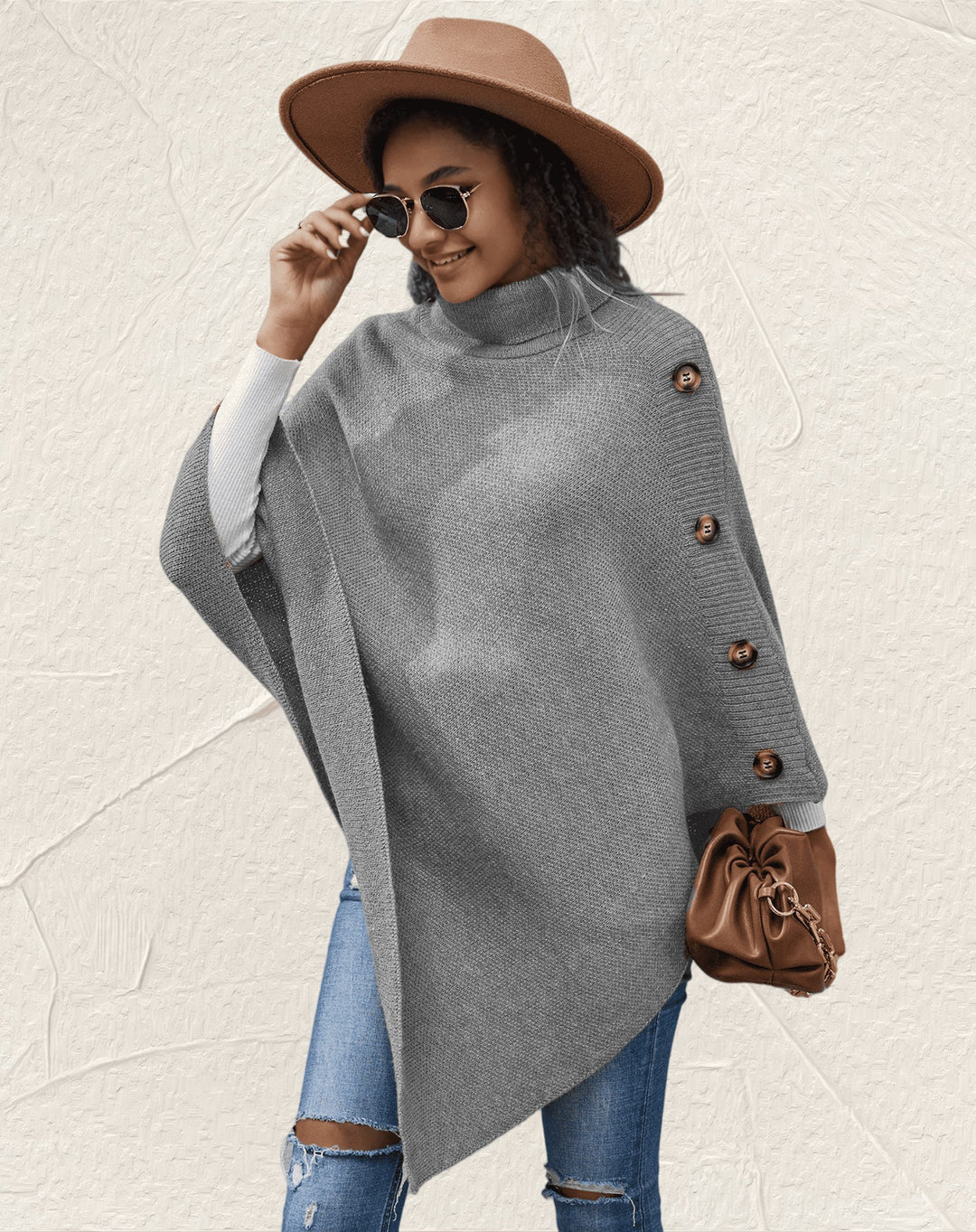 Elegant ladies poncho with high collar and decorative buttons Lune London
