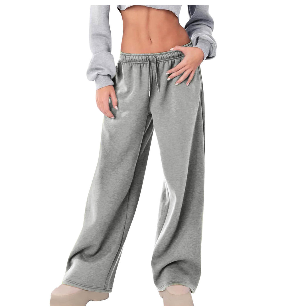 Women's loose casual pants with elastic waistband and side pockets Chic & Stil