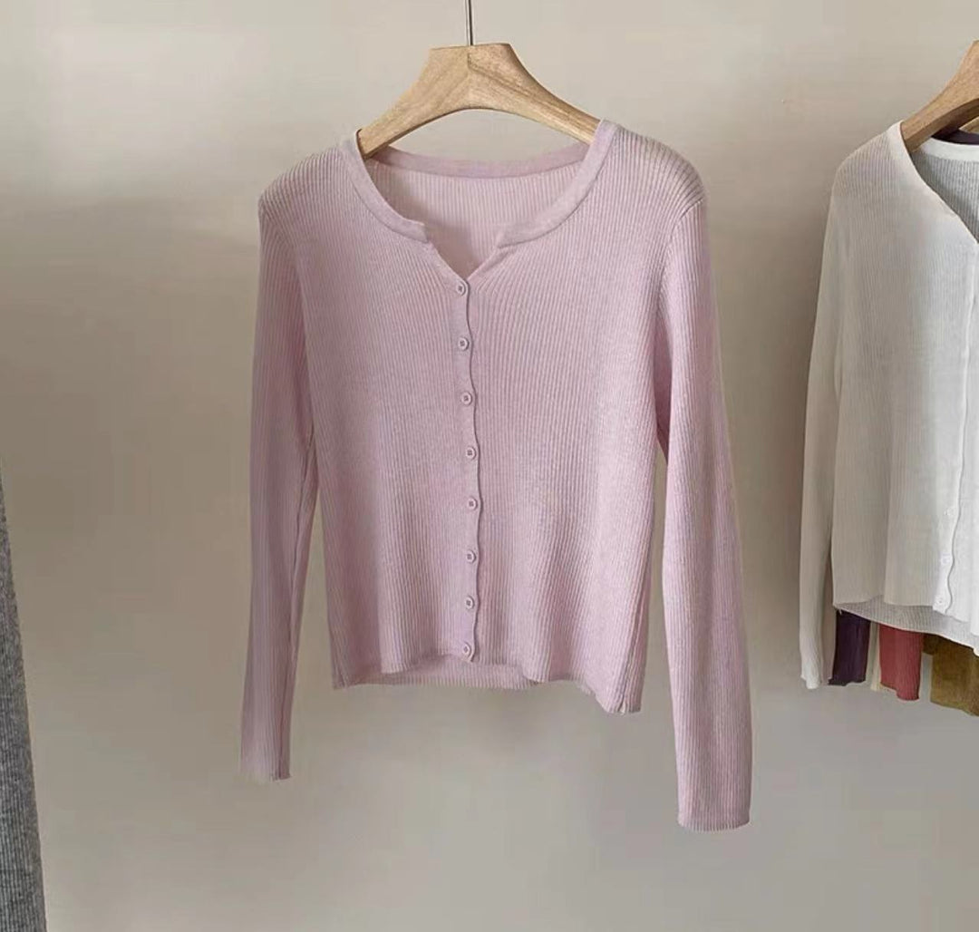 Fitted knit jacket for women with a stylish button closure and a fine ribbed structure Lune London