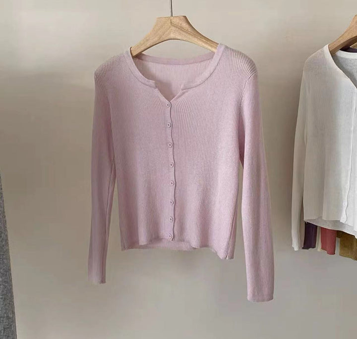 Fitted knit jacket for women with a stylish button closure and a fine ribbed structure Lune London