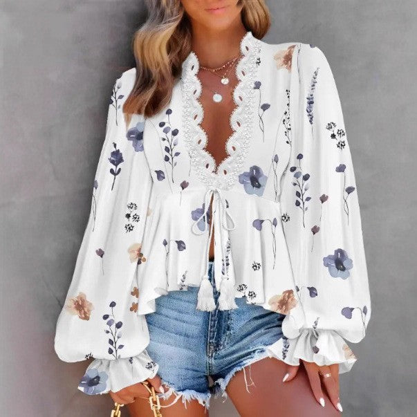 Lune London women's blouse with a playful floral print and lace edges