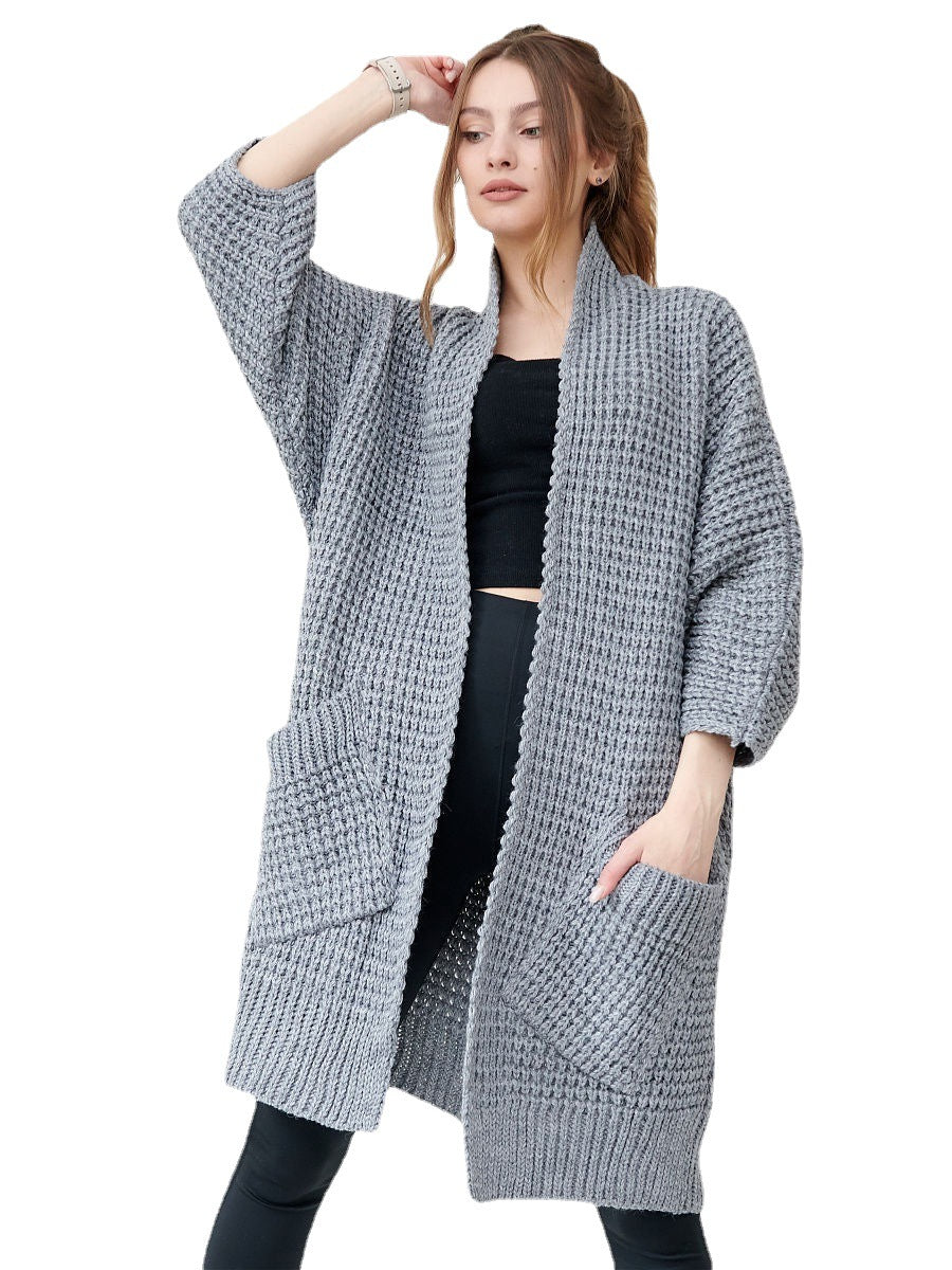 Ladies chunky knit cardigan with open fronts and practical pockets Lune London