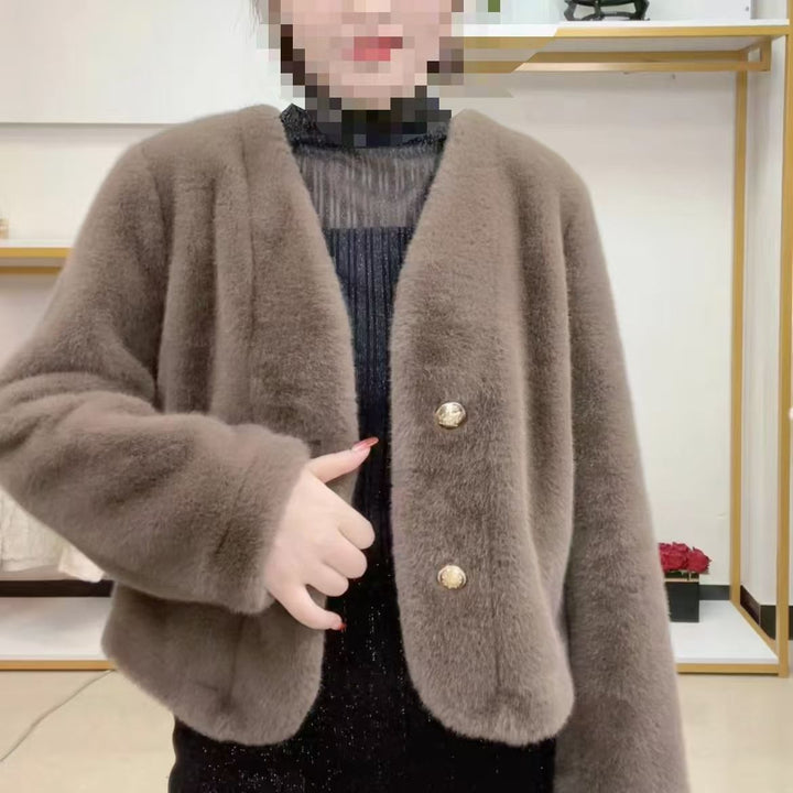 Veste courte en peluche pour femmes avec boutons élégants Chic & Stil