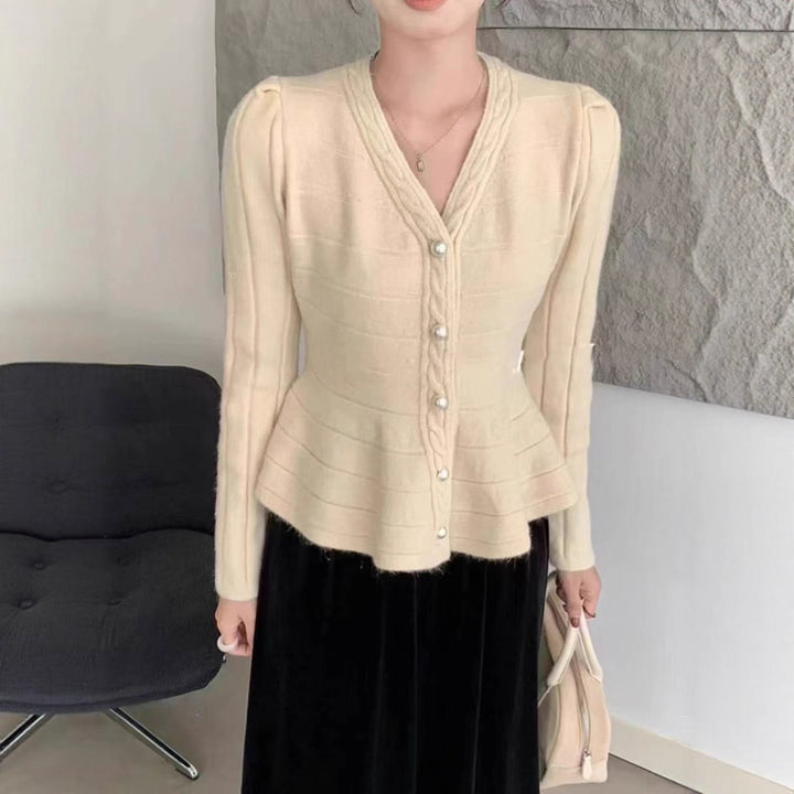 Ladies elegant cardigan with textured design and feminine puff sleeves Lune London