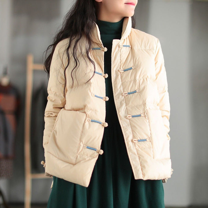 Veste matelassée légère pour femmes avec col montant et poches pratiques Chic & Stil