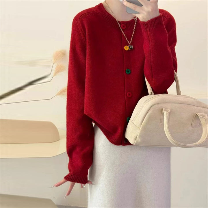 Ladies plush cardigan with colorful button details and a modern cut Lune London
