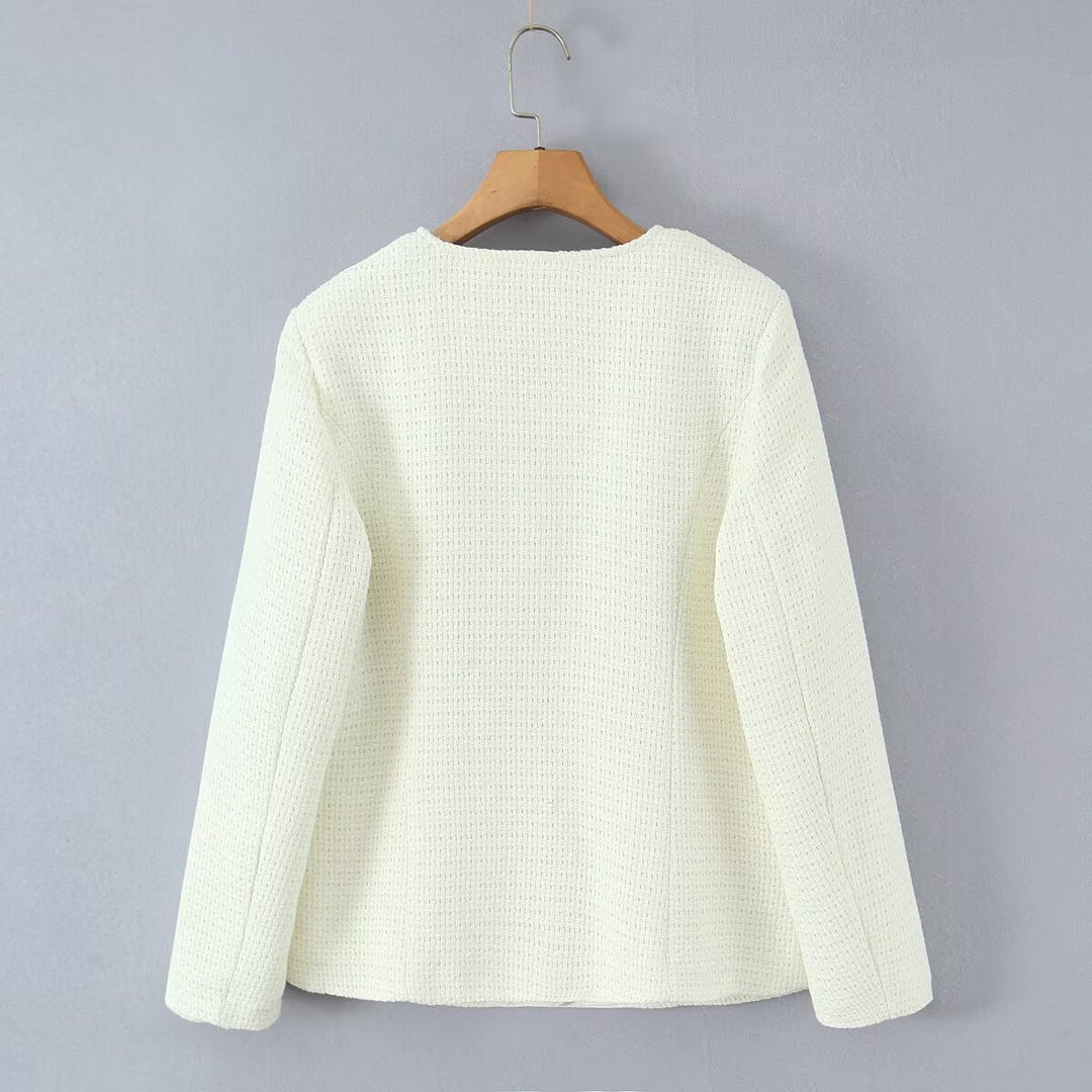 Ladies elegant knitted vest with textured design and pearl buttons Lune London