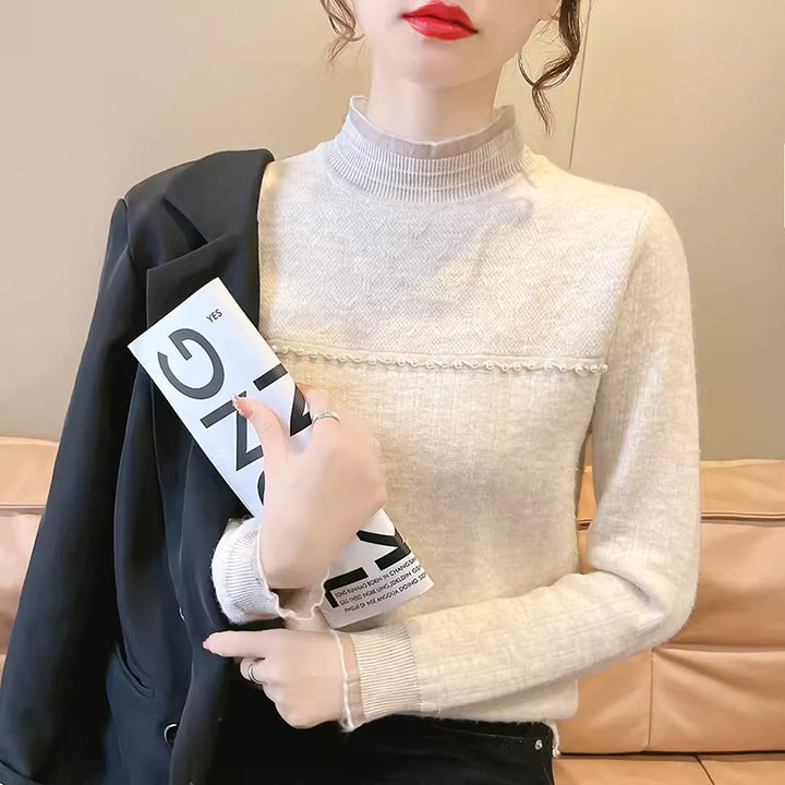 Ladies elegant knitted sweater with transparent inserts and ruffle details Lune London