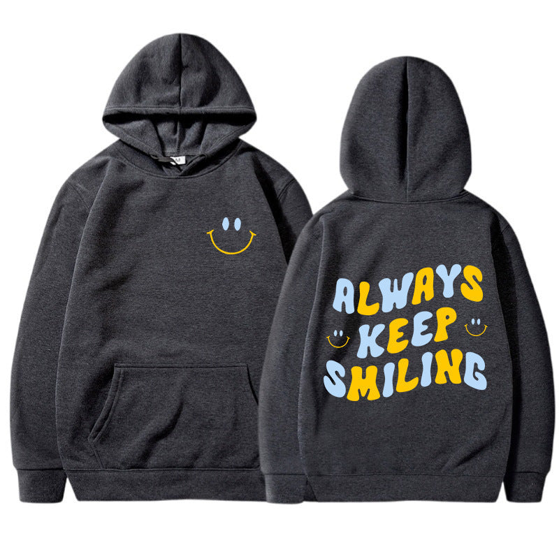 Ladies hoodie with cheerful lettering and practical kangaroo pockets Lune London