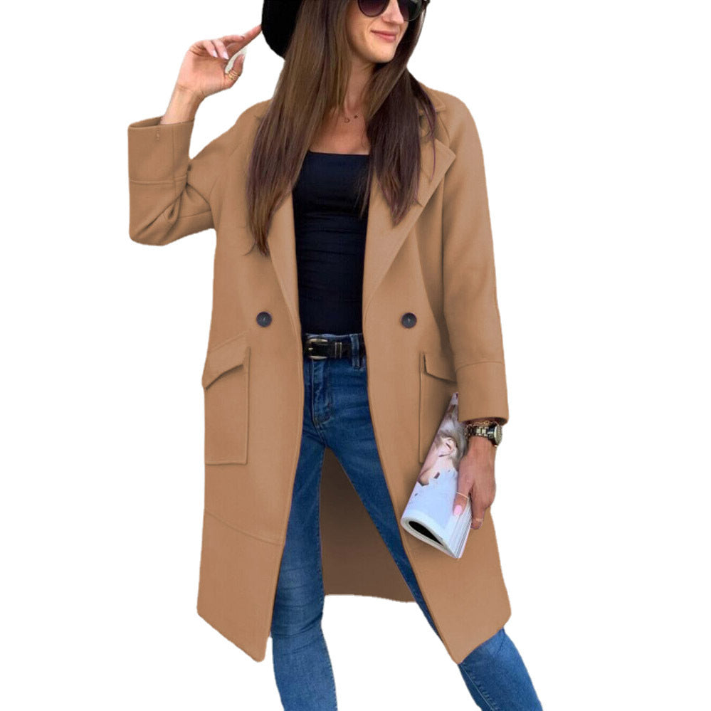 Trendy oversized coat for women with deep pockets and elegant button details Lune London