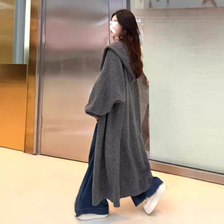 Manteau long en tricot pour femmes avec capuche décontractée et manches larges drapées