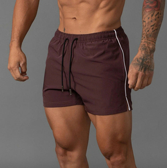 Shorts de bain sportifs pour hommes avec taille élastique et matériau à séchage rapide Lune London