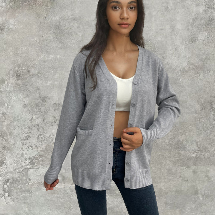 Knitted cardigan for ladies with button details and deep pockets Lune London