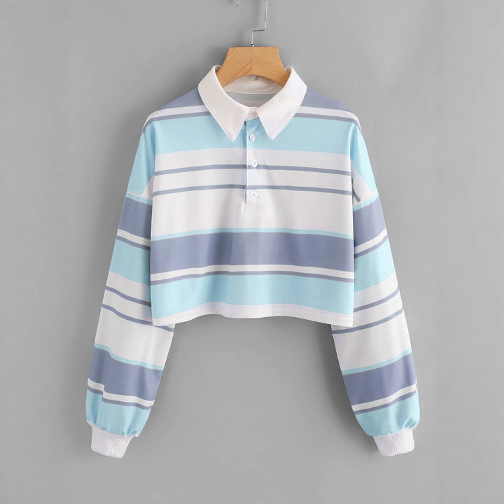 Women's polo shirt in a casual crop design with a stylish color block pattern Chic & Stil