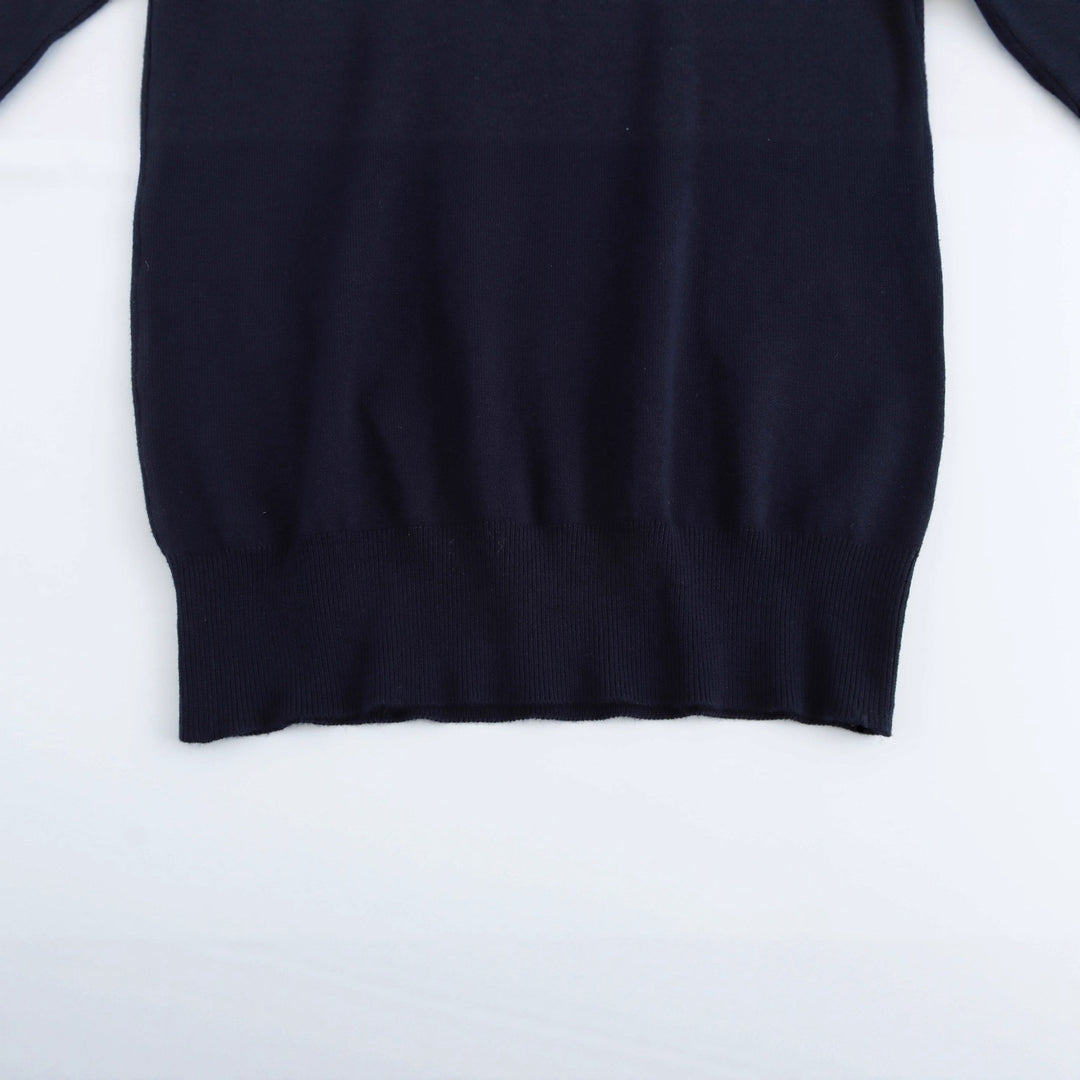 Ladies' turtleneck sweater with elegant button details Lune London