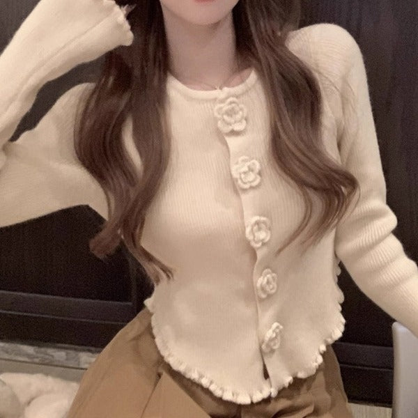 Elegant ladies cardigan with floral button details Lune London