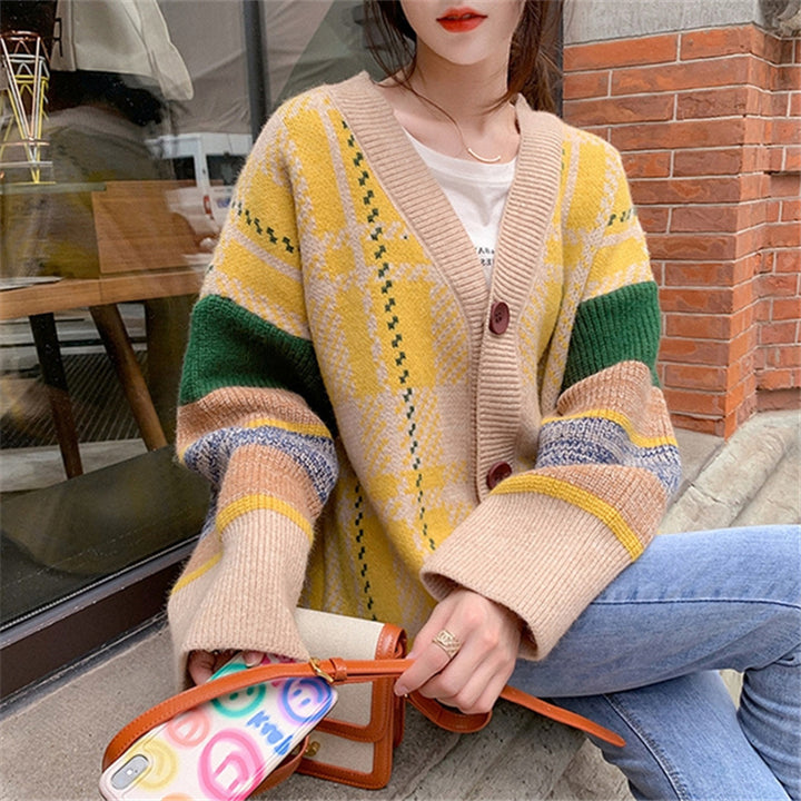Ladies oversized knitted sweater with colorful checked pattern and large wooden buttons Lune London
