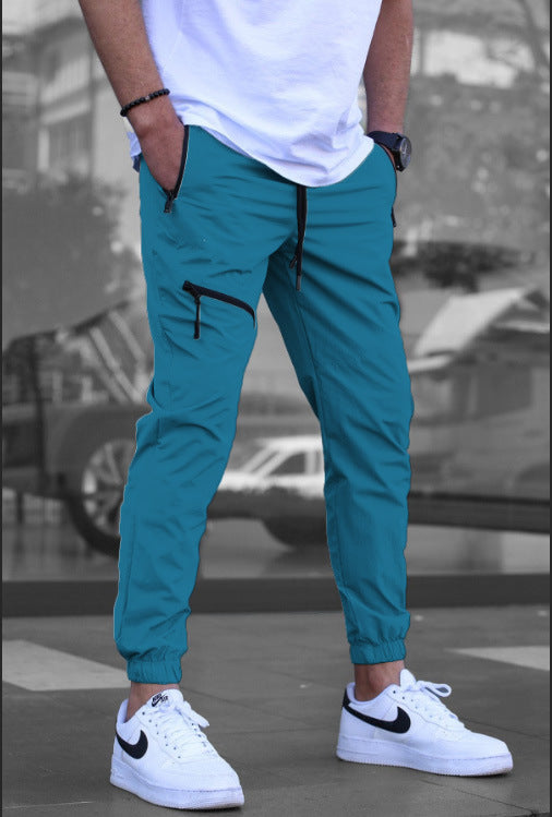 Light sporty pants for men with side zip pockets Lune London