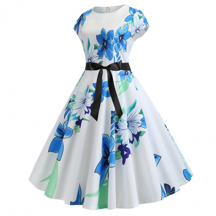 Robe swing femme avec des motifs floraux et une ceinture élégante Chic & Stil