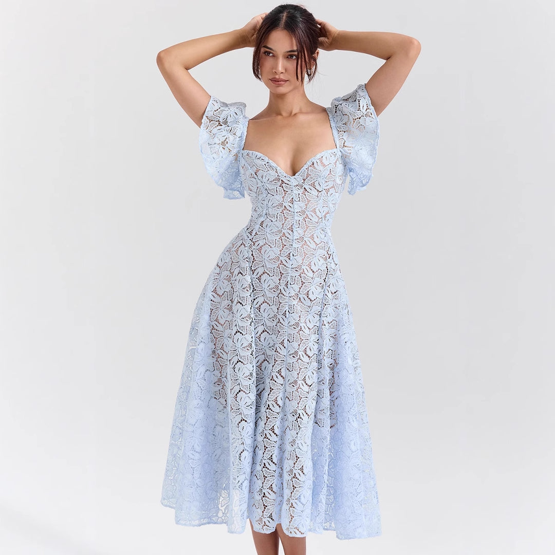Maxi lace dress for women with voluminous ruffles and a subtle heart-shaped neckline Chic & Stil