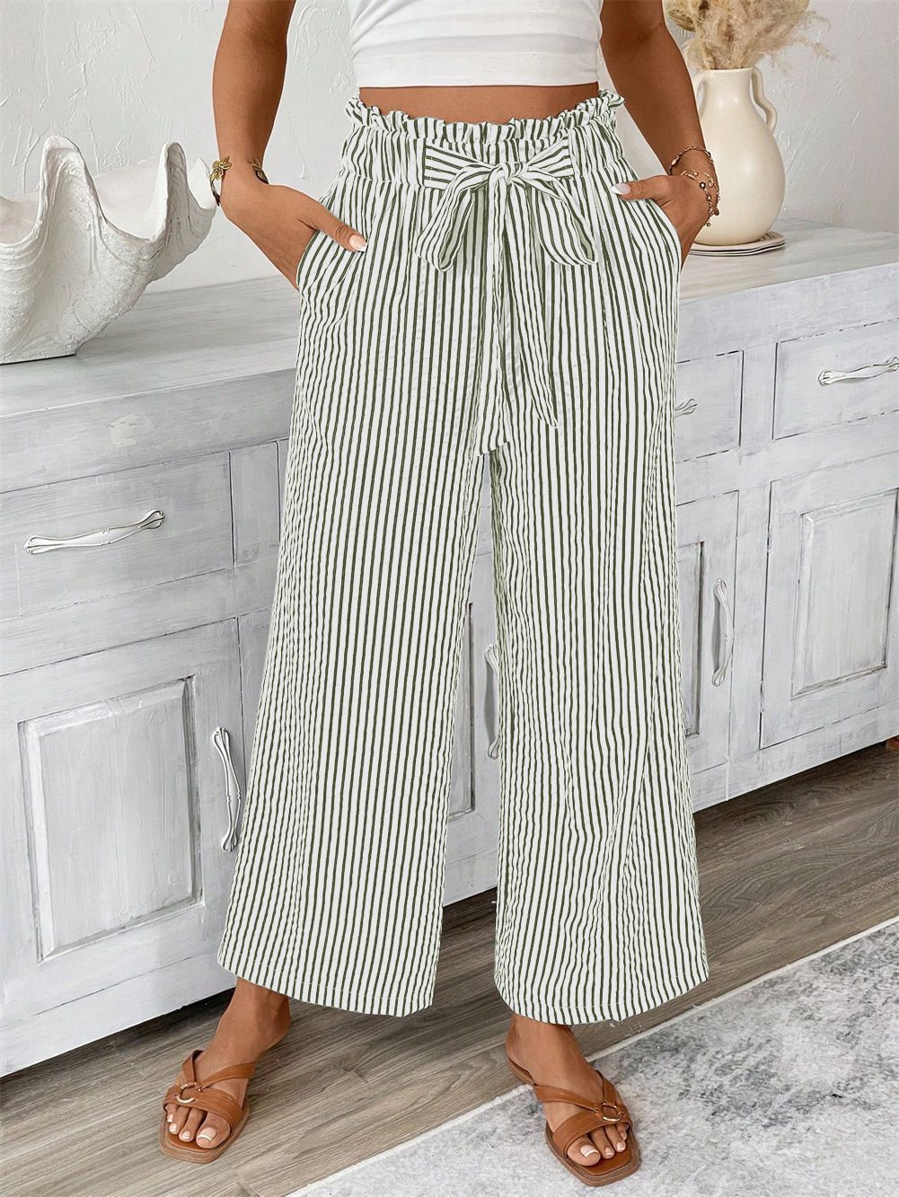 Wide striped leisure trousers for women with a tie belt Lune London
