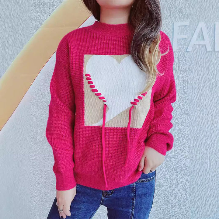 Pull féminin à la mode avec appliqué en forme de cœur et cordon de serrage à l'arrière Chic & Stil