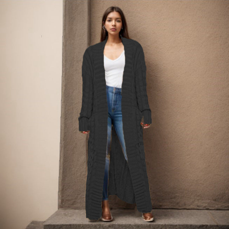 Ladies Long knit cardigan with structured twisted pattern and practical pockets Lune London