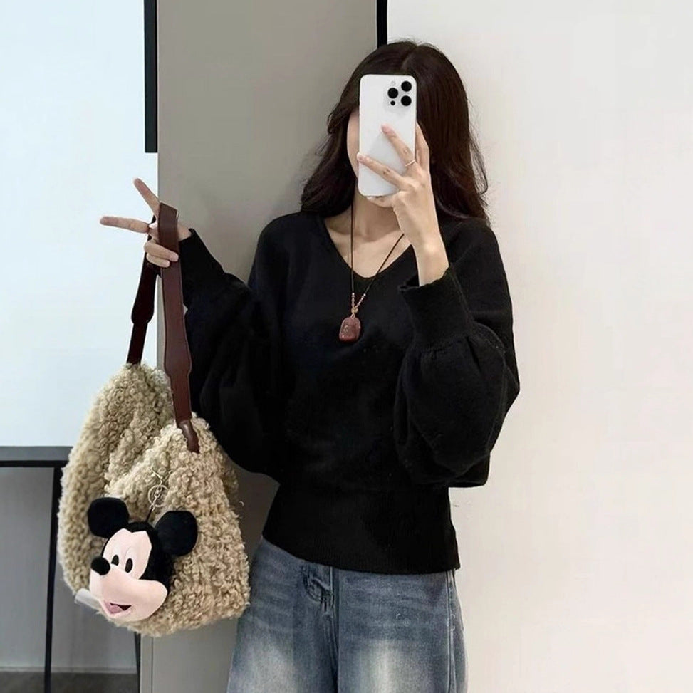 Pull moderne pour femmes avec col en V et ceinture à nouer optionnelle Chic & Stil