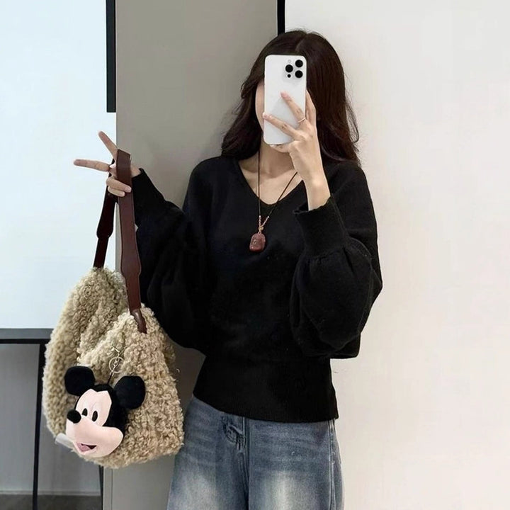 Pull moderne pour femmes avec col en V et ceinture à nouer optionnelle Chic & Stil