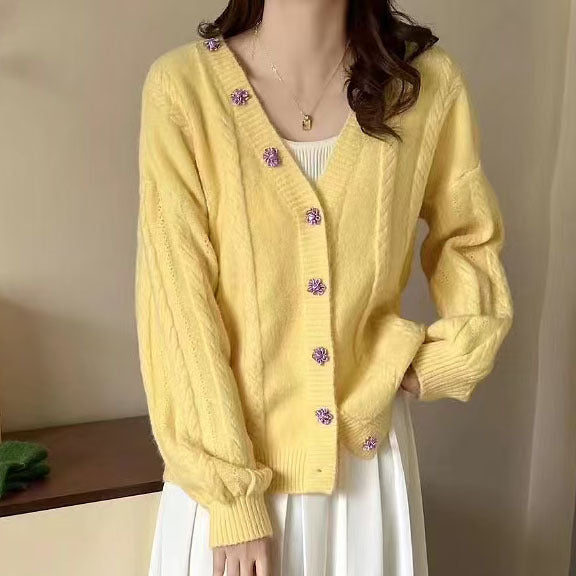 Women's knitted jacket with decorative buttons and a cable pattern Lune London