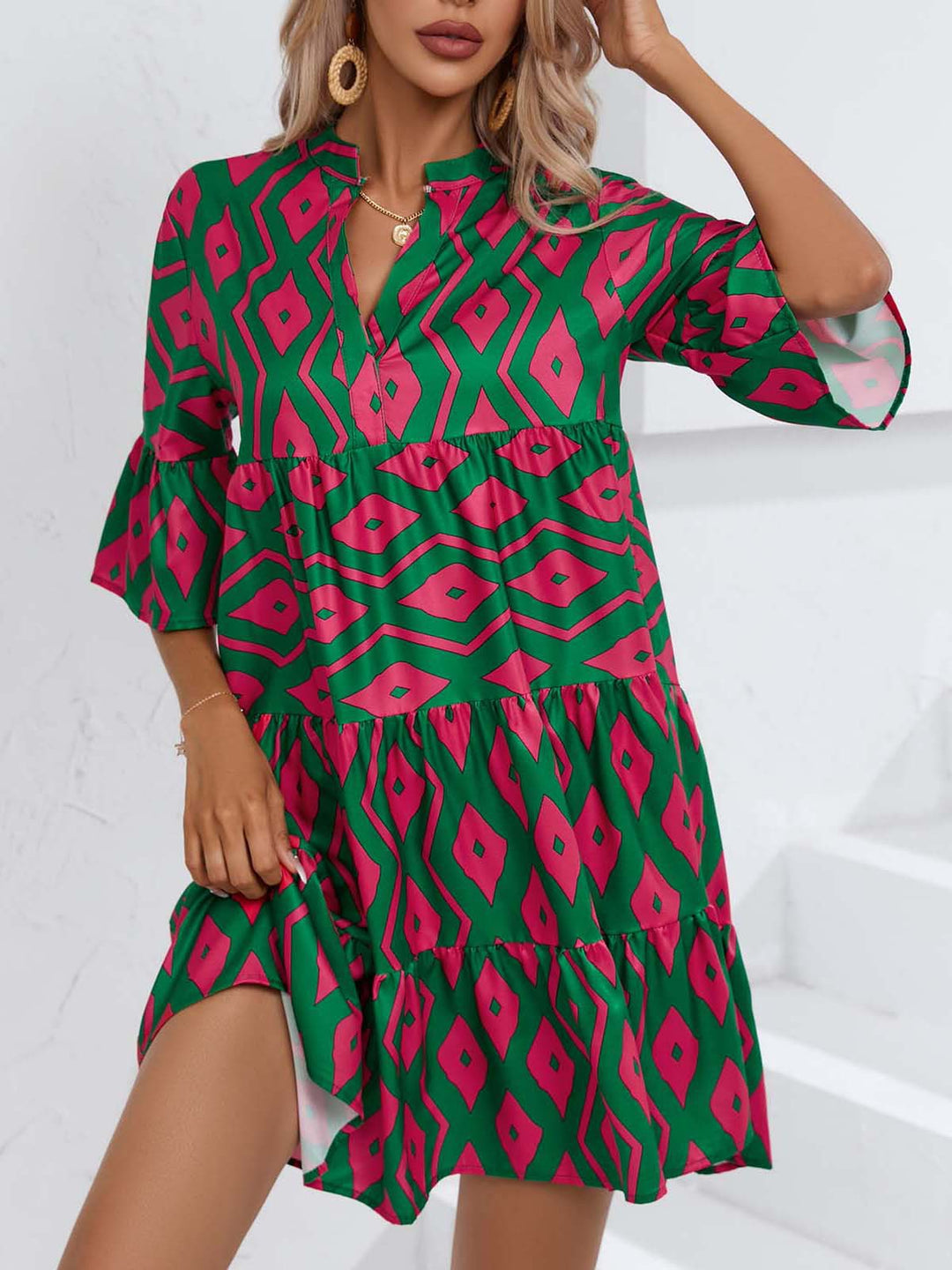 Shirt dress for women with voluminous ruffled sleeves and a playful floral pattern Lune London