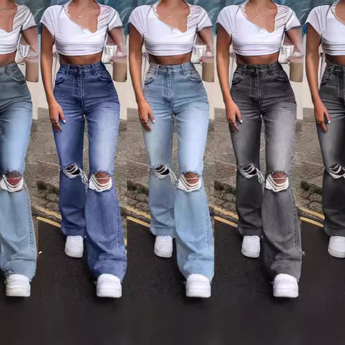 Ladies vintage flared jeans with stylish ripped details and high waistband Lune London