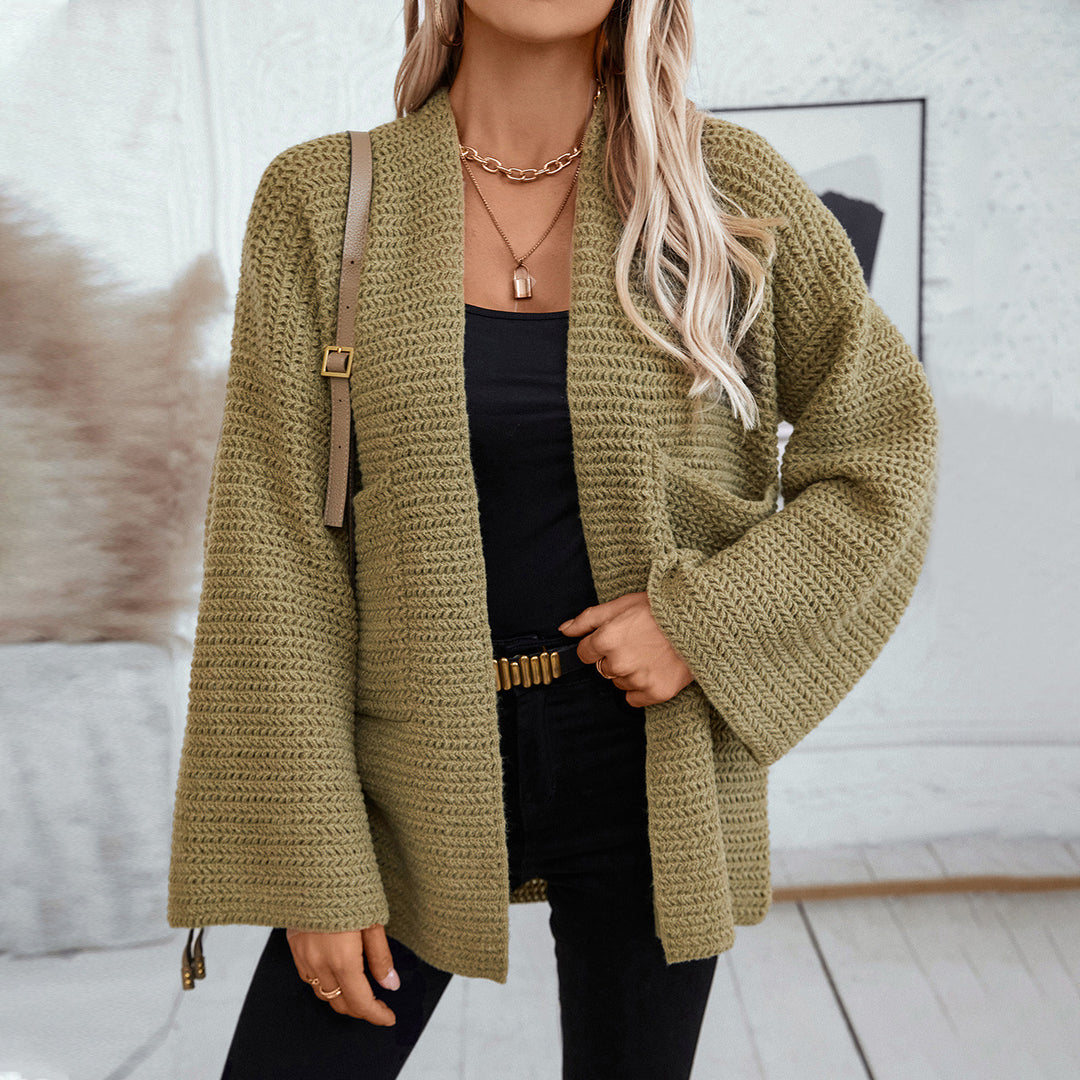 Airy knitted jacket for women with large pockets and open sleeves Lune London