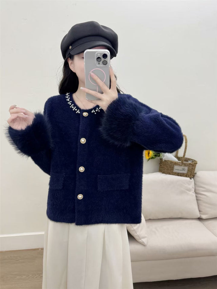 Cardigan élégant pour femmes avec décoration de perles et manches duveteuses Chic & Stil