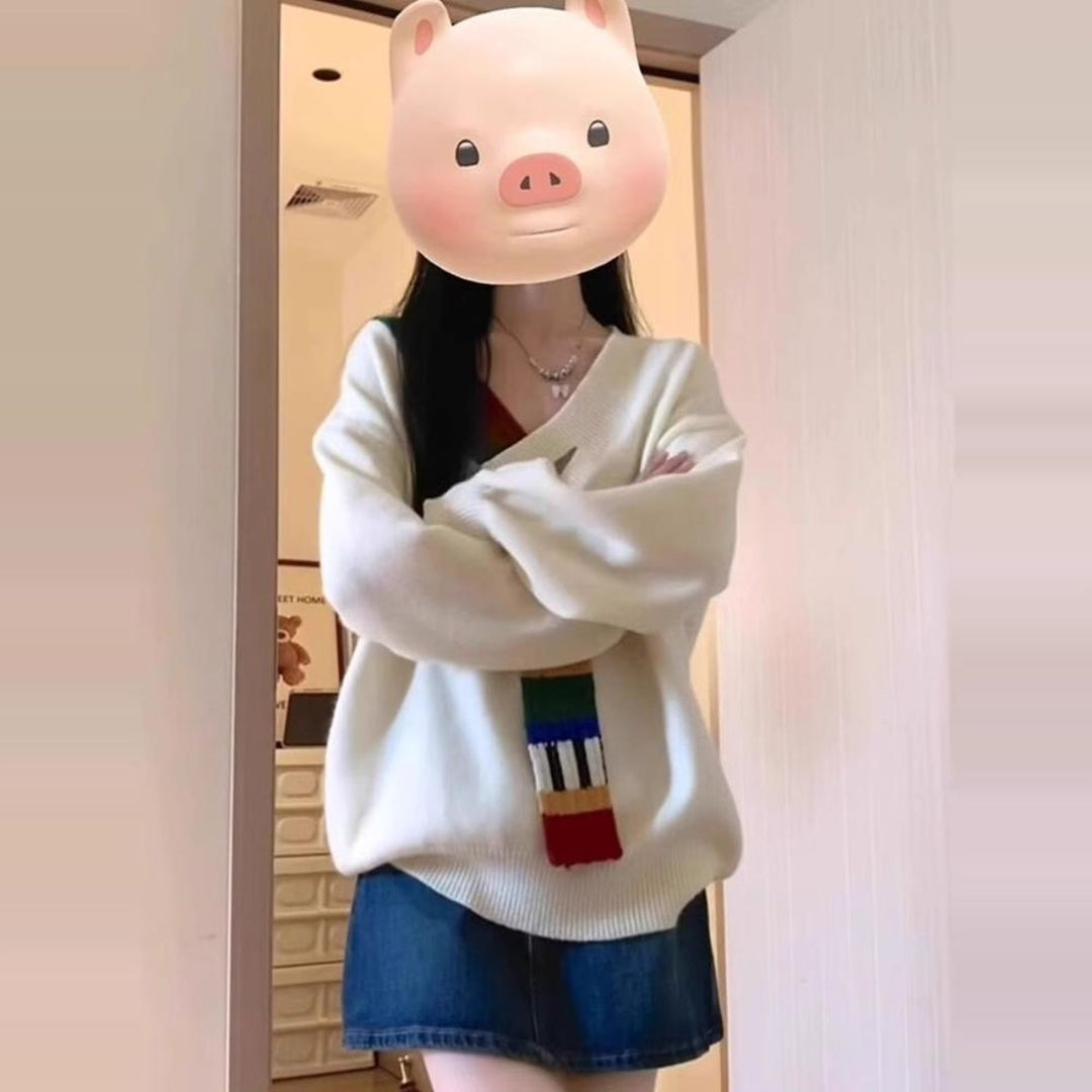 Pull élégant pour femme avec col en V et rayures colorées Chic & Stil