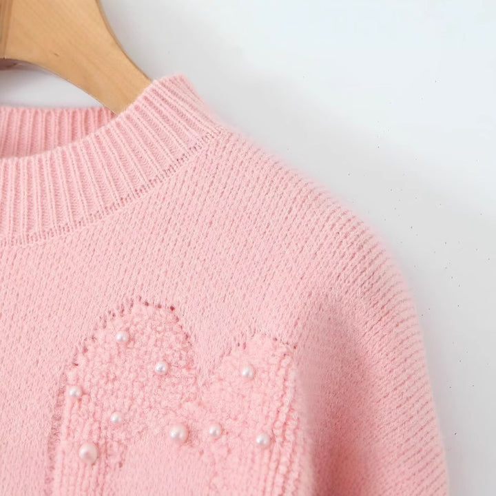 Pull en tricot confortable pour femmes avec motifs en cœur Chic & Stil