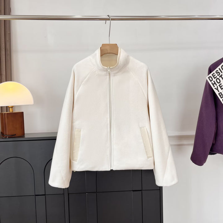 Veste en polaire confortable pour femmes avec col haut et poches pratiques Chic & Stil